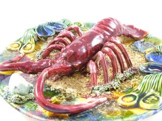   majolica spiny lobster dish decorated with clams and mussels painted