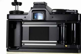 Black Olympus OM 4Ti Camera + Zuiko Auto S 50mm F/1.4 Lens  