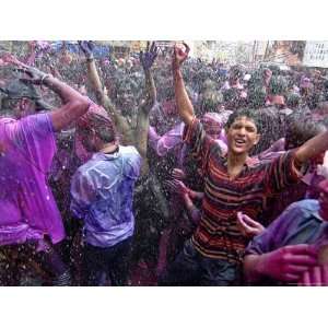 Faces Smeared with Colors, Celebrate Holi Associated Press Collection 