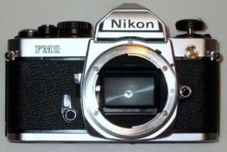 Nikon FM2 35mm SLR Film Camera Body (for Repair) with 28 70mm TOKINA 