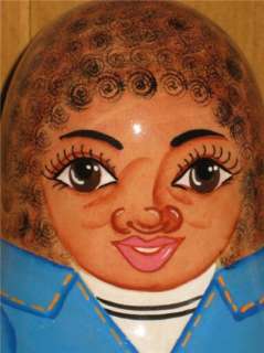 It is a traditional wobbly doll shape. It is painted beautifully as a 