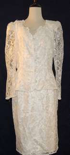   white floral lace pattern over white slip matching embroidery around