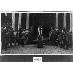   Front,Priest at top of steps behind coffin,c1915