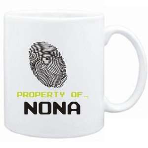  Mug White  Property of _ Nona   Fingerprint  Female 