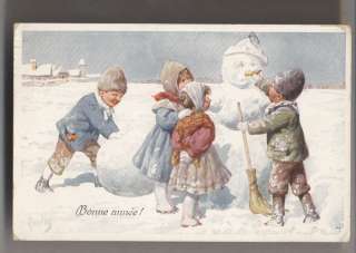 CHILDREN making a SNOWMAN artist signed Old Postcard  