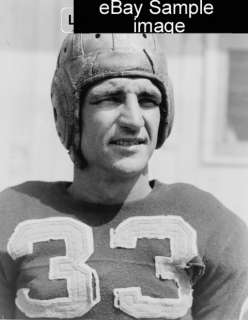 1938 Sammy Baugh in football jersey & helmet  