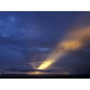 Shaft of Light Through Storm Clouds, Masai Mara Game Reserve, Kenya 