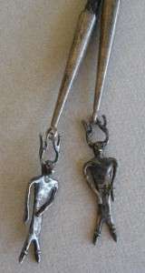 one of a kind sterling bolo tie with a large Shamanistic figure 