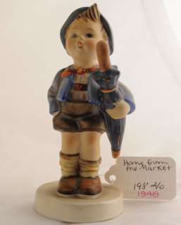 This Hummel figurine has been carefully stored as part of a collection 