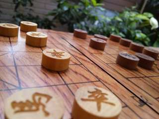 Chinese chess, xiangqi, wooden chessboad and pieces  