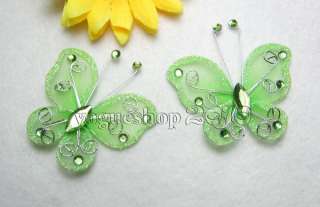 These beautyful butterfly is handmade by nylon fabric and silver metal 