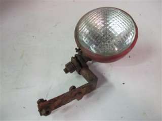 This  auction is for a n IH Farmall 130 Tractor Rearlight
