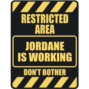   RESTRICTED AREA JORDANE IS WORKING  PARKING SIGN