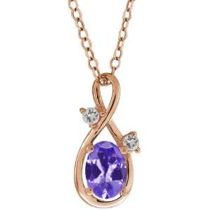  0.83 Ct Oval Blue Tanzanite and White Topaz 18k Rose Gold 