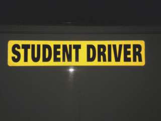 _student_driver_black_yellow_close_up