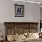 at each corner in a deep cappuccino finish this bed will add a touch