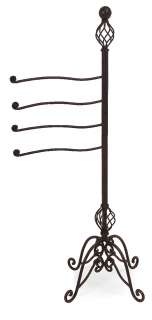 This blanket ortowel rack is made of wrought iron. Scroll design. The 