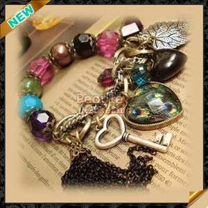 Vintage Bracelet/Leaf Tassel Peacock Heart Key Charms  