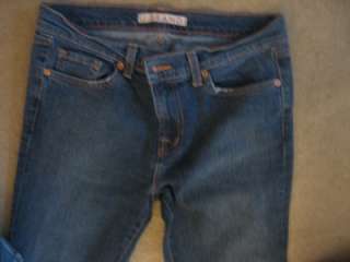 UP FOR AUCTION ARE USED J BRAND JEANS   LOW RISE, MEDIUM BLUE DENIM 