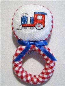 CROSS STITCHED BABY RATTLE W/TRAIN~RED & WHITE HANDLE  