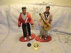 Elvis dolls with racord 2 stands and extras