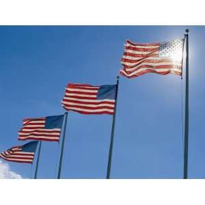  A Stiff Breeze Blows a Row of American Flags on the 