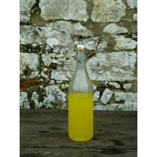 Bottle of Limoncello Sits on a Picnic Table at a Tuscan Villa, Tuscany 