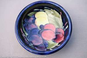 Moorcroft bowl in Wisteria pattern to a cobalt blue ground Circa 