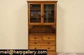   1890, this charming country pine cabinet has old wavy glass doors